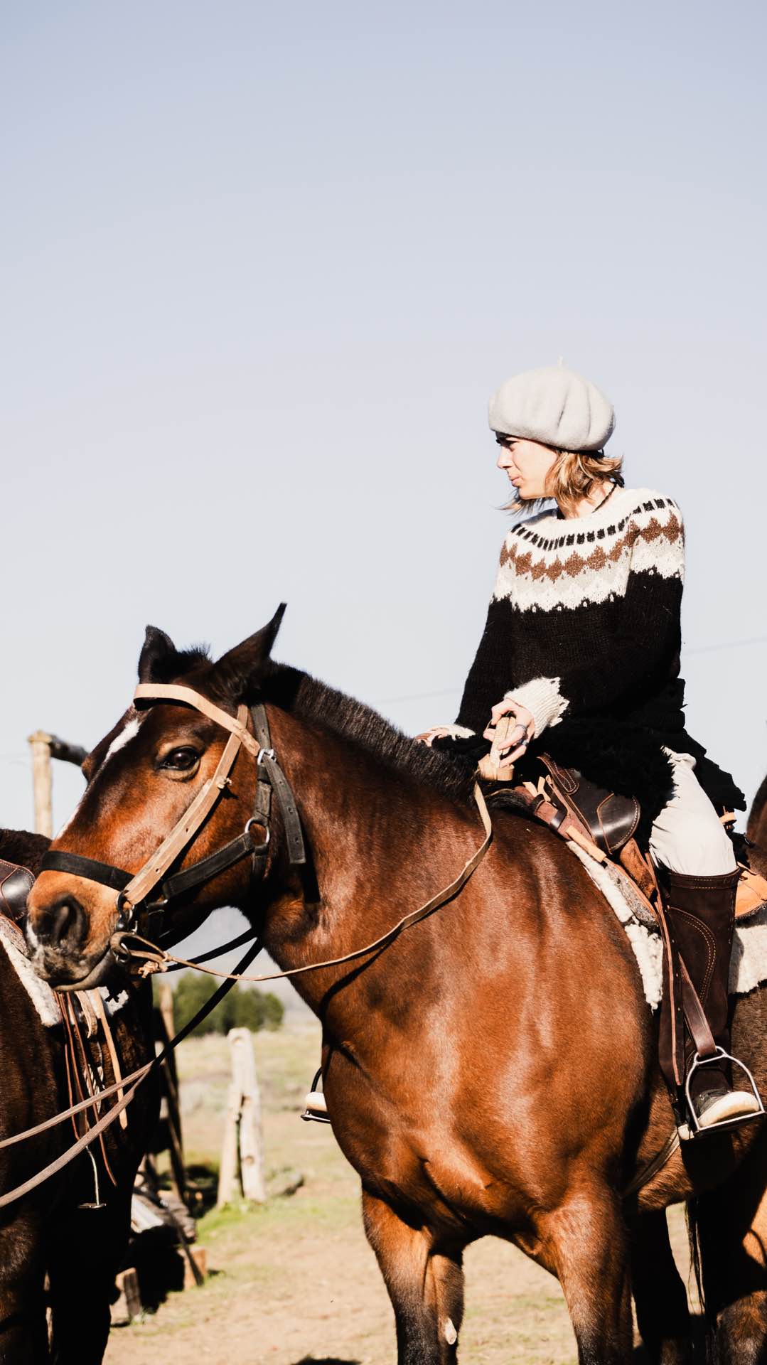 On horseback in open country