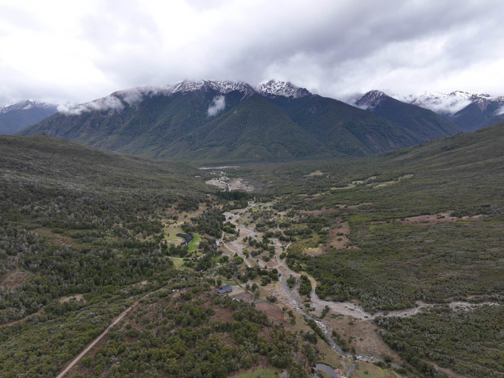 Open valley and snow-capped peaks
