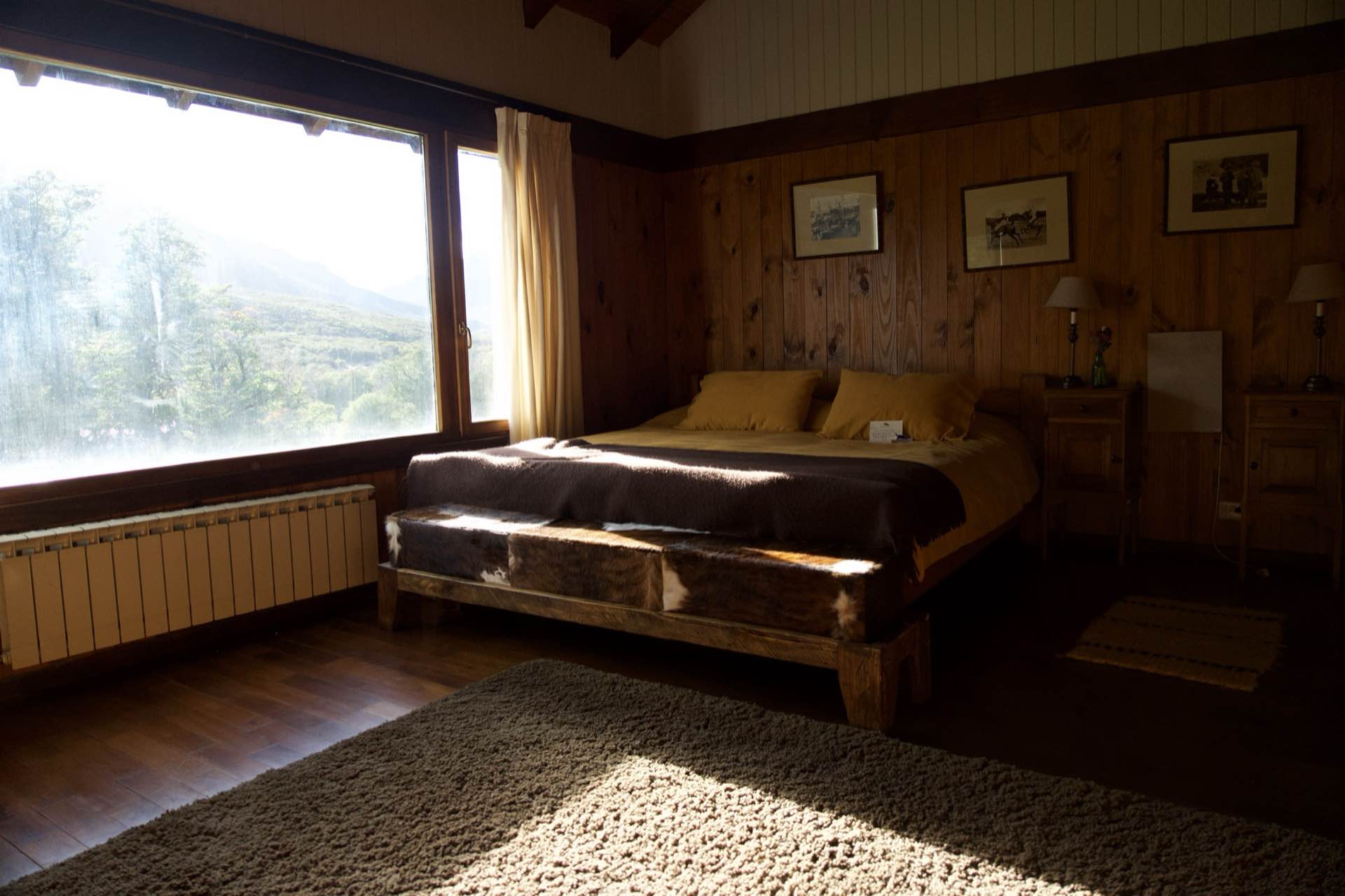 A bedroom with a view of the valley