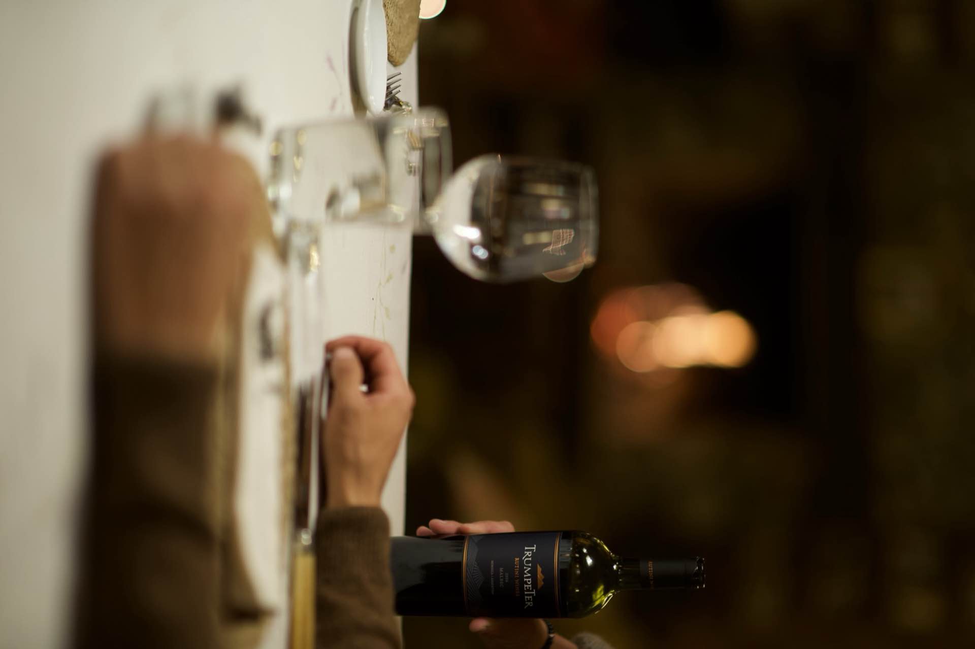 Wine at the table beside the fire